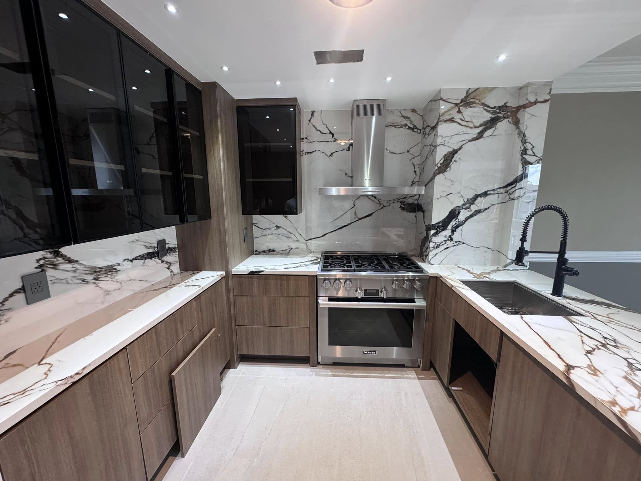 New construction kitchen with custom cabinetry by TASH Construction and Remodeling