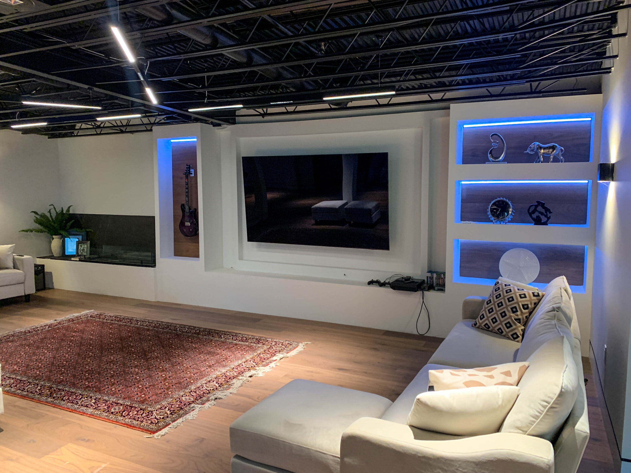 Basement remodel with custom lighting by TASH Construction and Remodeling