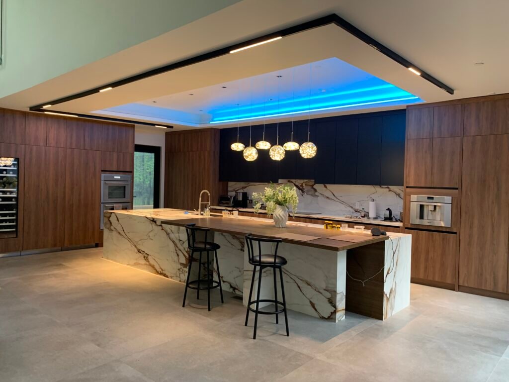 Kitchen remodeling project with island by TASH Construction and Remodeling